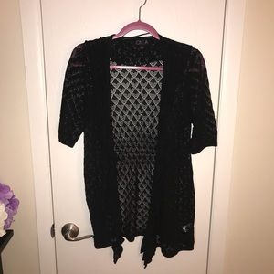 Black summer sweater with pattern detail
